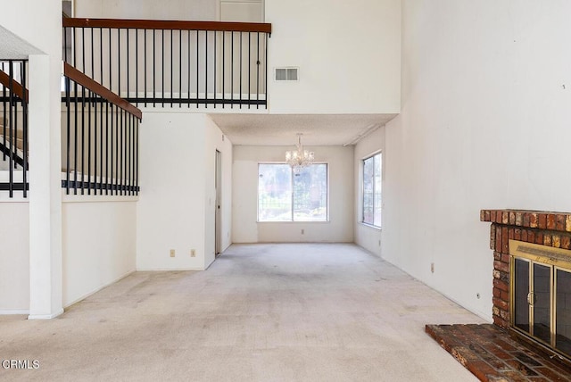 2026 Thomas Pl, West Covina, CA 91792 - unfurnished living room with a brick fireplace, a chandelier, carpet floors, stairway, and a high ceiling