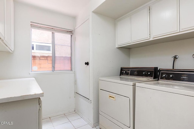 2026 Thomas Pl, West Covina, CA 91792 - washroom featuring cabinet space, independent washer and dryer, and light tile patterned floors