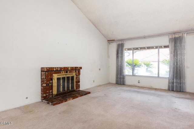 2026 Thomas Pl, West Covina, CA 91792 - unfurnished living room featuring carpet floors, a fireplace, and high vaulted ceiling