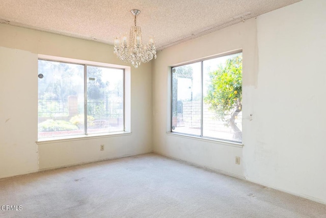 2026 Thomas Pl, West Covina, CA 91792 - carpeted empty room featuring a chandelier and a textured ceiling