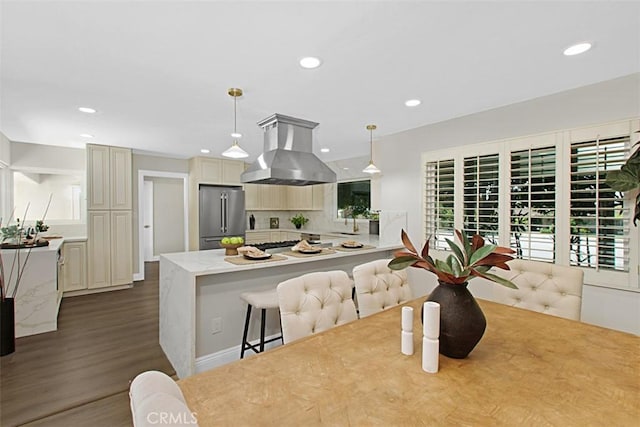 1604 N Laurel Ave, Upland, CA 91784 - kitchen featuring island exhaust hood, freestanding refrigerator, recessed lighting, a peninsula, and dark wood-type flooring