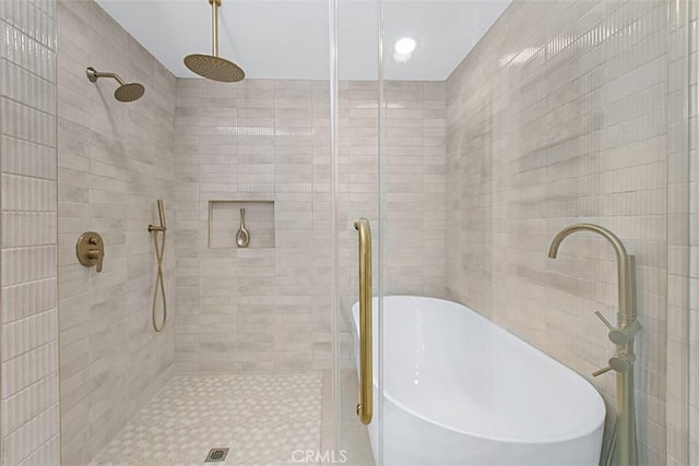 1604 N Laurel Ave, Upland, CA 91784 - full bath with a shower stall and a freestanding tub