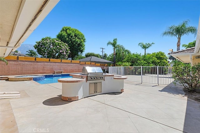 1604 N Laurel Ave, Upland, CA 91784 - view of pool with exterior kitchen, a fenced backyard, and a patio area