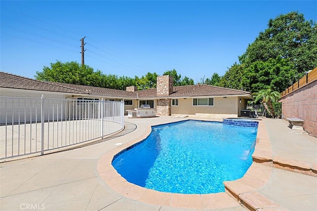 1604 N Laurel Ave, Upland, CA 91784 - view of swimming pool featuring a patio area and a pool with connected hot tub