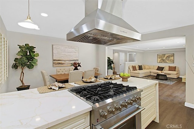 1604 N Laurel Ave, Upland, CA 91784 - kitchen with wall chimney range hood, high end stainless steel range oven, dark wood-style flooring, light stone counters, and cream cabinetry