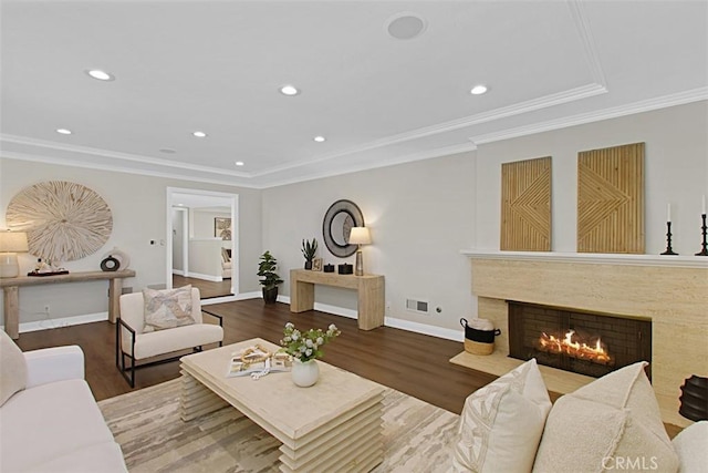 1604 N Laurel Ave, Upland, CA 91784 - living area with recessed lighting, ornamental molding, a premium fireplace, and wood finished floors