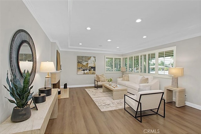 1604 N Laurel Ave, Upland, CA 91784 - living area featuring crown molding, wood finished floors, and recessed lighting