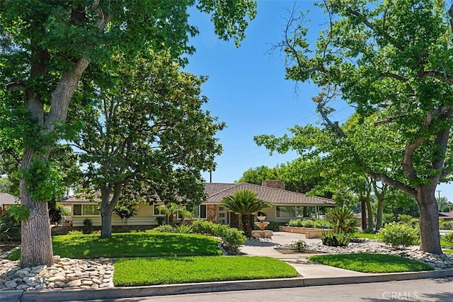 1604 N Laurel Ave, Upland, CA 91784 - view of front of house with a chimney and a front yard