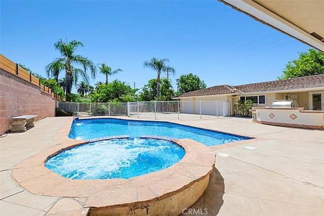 1604 N Laurel Ave, Upland, CA 91784 - view of swimming pool with an outdoor kitchen, a patio area, and a pool with connected hot tub