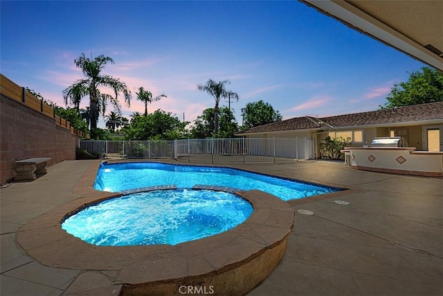 1604 N Laurel Ave, Upland, CA 91784 - view of swimming pool with a patio area, a pool with connected hot tub, and an outdoor kitchen