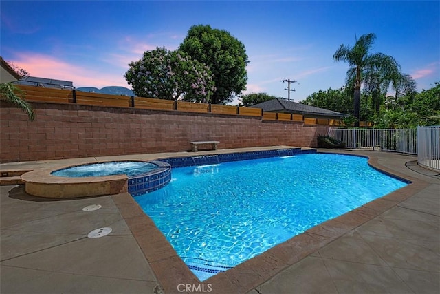 1604 N Laurel Ave, Upland, CA 91784 - view of pool featuring a pool with connected hot tub and a patio
