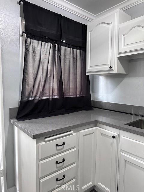 1500 E Wardlow Rd, Long Beach, CA 90807 - kitchen with white cabinets