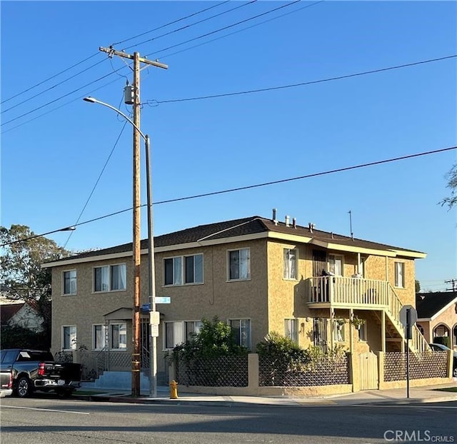 1500 E Wardlow Rd, Long Beach, CA 90807 - view of building exterior featuring a fenced front yard