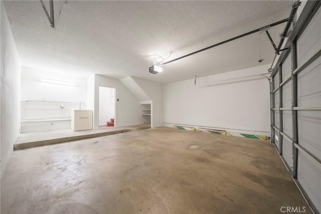 1927 Huntington Dr Unit C, Duarte, CA 91010 - garage featuring a garage door opener