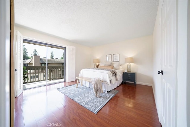 1927 Huntington Dr Unit C, Duarte, CA 91010 - bedroom with access to outside, wood finished floors, and a textured ceiling