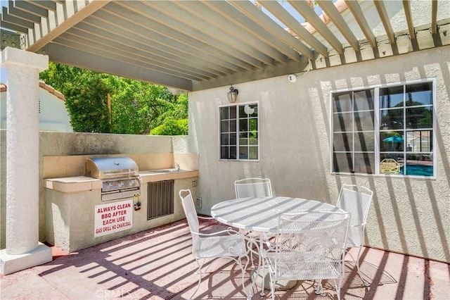 37940 42nd St E Unit 129, Palmdale, CA 93552 - view of patio featuring area for grilling and outdoor dining area