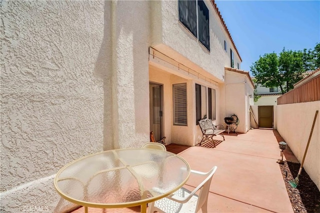 37940 42nd St E Unit 129, Palmdale, CA 93552 - view of patio / terrace with outdoor dining space