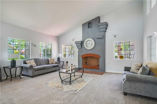 37940 42nd St E Unit 129, Palmdale, CA 93552 - carpeted living room featuring high vaulted ceiling and a large fireplace