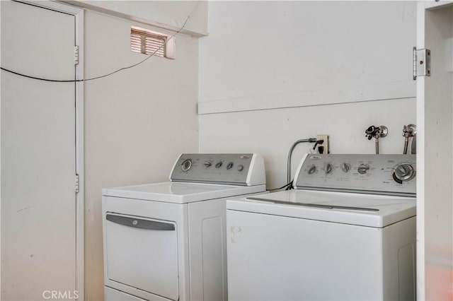 37940 42nd St E Unit 129, Palmdale, CA 93552 - washroom with washer and clothes dryer