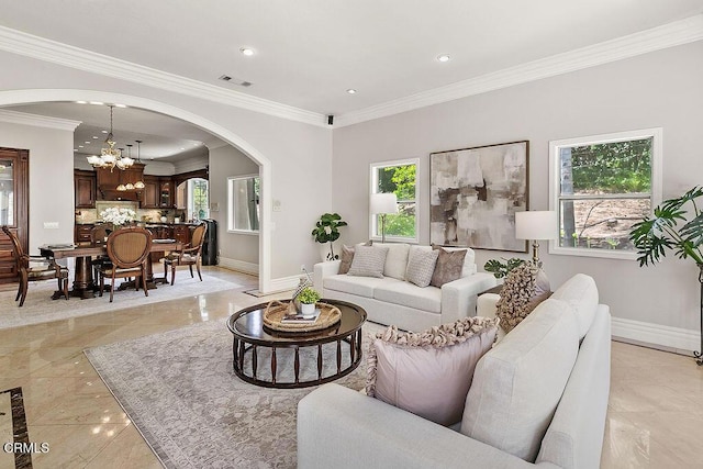 2981 Yucca Dr, Camarillo, CA 93012 - living area featuring arched walkways, a chandelier, ornamental molding, recessed lighting, and light marble finish floors
