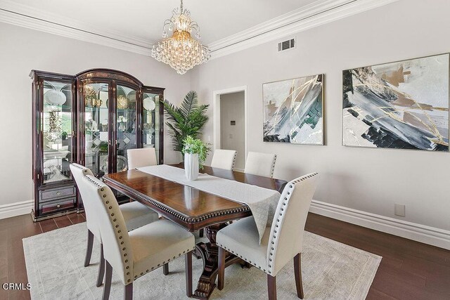 2981 Yucca Dr, Camarillo, CA 93012 - dining space with a chandelier, crown molding, and wood finished floors