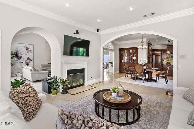 2981 Yucca Dr, Camarillo, CA 93012 - living area with ornamental molding, a chandelier, recessed lighting, arched walkways, and tile patterned floors