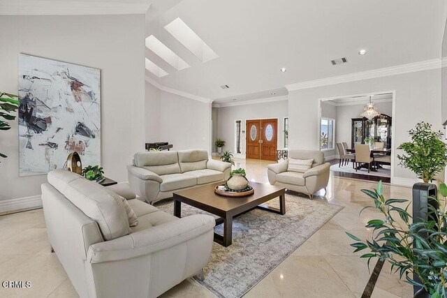 2981 Yucca Dr, Camarillo, CA 93012 - living room with ornamental molding, recessed lighting, lofted ceiling, and a skylight