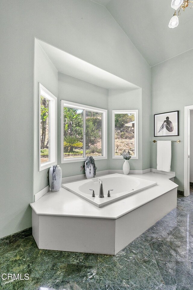 2981 Yucca Dr, Camarillo, CA 93012 - bathroom featuring a bath and vaulted ceiling