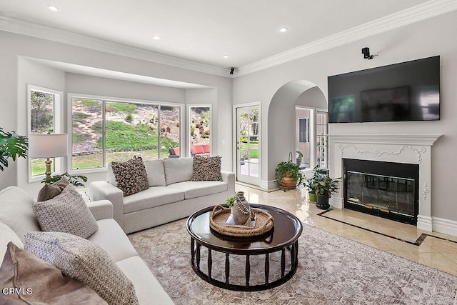 2981 Yucca Dr, Camarillo, CA 93012 - living area featuring arched walkways, ornamental molding, recessed lighting, inlaid floor details, and a fireplace