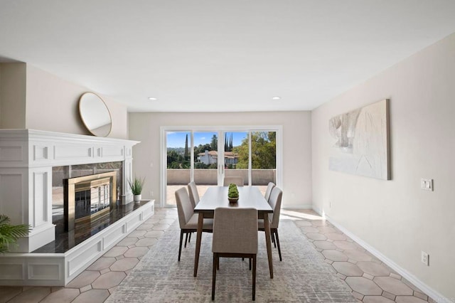 917 Gretna Green Way, Escondido, CA 92025 - dining space featuring a high end fireplace and recessed lighting