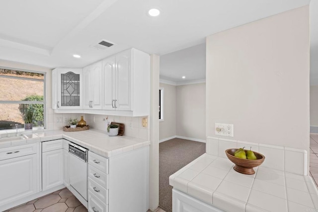 917 Gretna Green Way, Escondido, CA 92025 - kitchen with white dishwasher, tile counters, recessed lighting, white cabinets, and backsplash