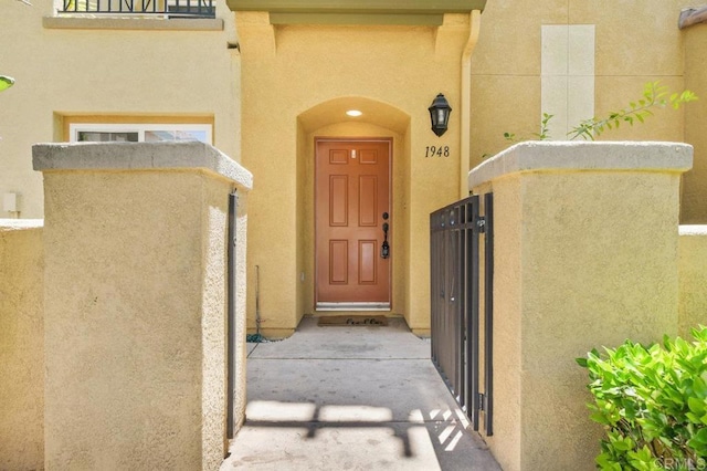 1948 Caminito De La Cruz, Chula Vista, CA 91913 - property entrance with stucco siding and a gate