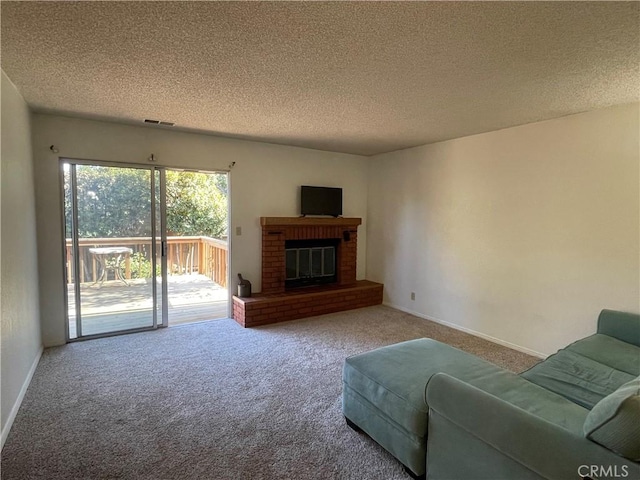 1039 Maple St, Arroyo Grande, CA 93420 - carpeted living area with a textured ceiling and a fireplace
