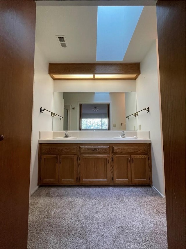 1039 Maple St, Arroyo Grande, CA 93420 - bathroom featuring double vanity and carpet flooring