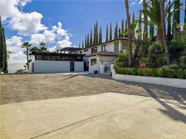 567 Lone Oak Dr, Thousand Oaks, CA 91362 - view of front of home with stucco siding and stairs