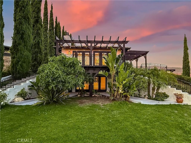 567 Lone Oak Dr, Thousand Oaks, CA 91362 - rear view of house featuring a pergola and a lawn