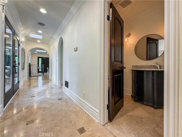 567 Lone Oak Dr, Thousand Oaks, CA 91362 - hall with arched walkways, ornamental molding, and recessed lighting