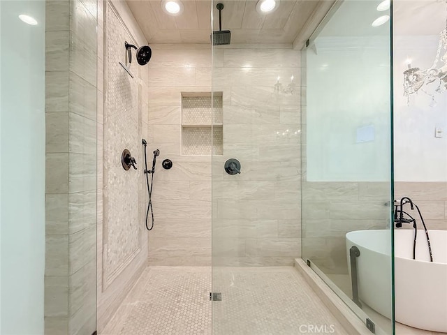 567 Lone Oak Dr, Thousand Oaks, CA 91362 - full bath with recessed lighting, tiled shower, a soaking tub, and tile walls
