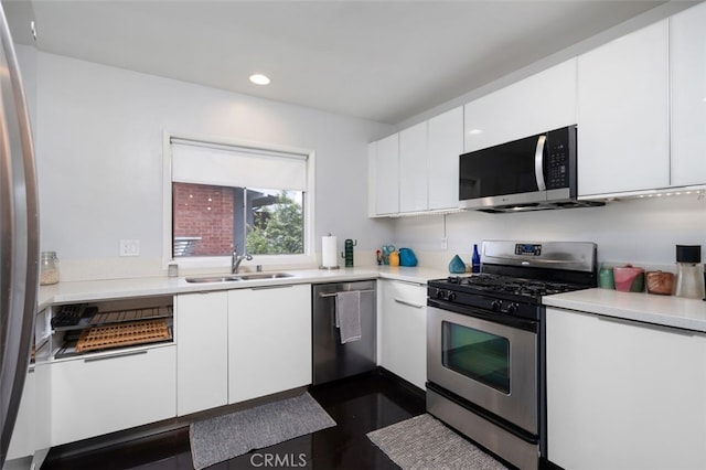 365 Hastings Ranch Rd Unit 4, Pasadena, CA 91107 - kitchen with appliances with stainless steel finishes, white cabinets, recessed lighting, and light countertops
