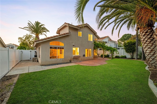 41024 Montelena Cir, Temecula, CA 92591 - rear view of house featuring a gate, a fenced backyard, a patio area, and stucco siding