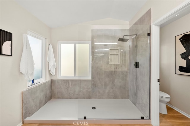 41024 Montelena Cir, Temecula, CA 92591 - bathroom with lofted ceiling, a walk in shower, and wood finished floors