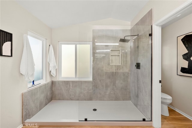 41024 Montelena Cir, Temecula, CA 92591 - bathroom featuring tiled shower, lofted ceiling, and wood finished floors