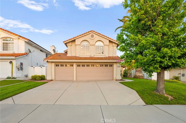 41024 Montelena Cir, Temecula, CA 92591 - mediterranean / spanish-style home with driveway, stucco siding, a front lawn, and a tiled roof