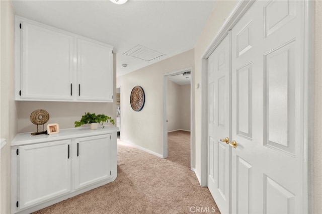 41024 Montelena Cir, Temecula, CA 92591 - hallway featuring light colored carpet and baseboards