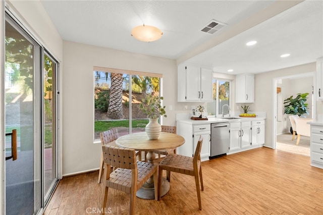 41024 Montelena Cir, Temecula, CA 92591 - dining room with light wood-style flooring and recessed lighting