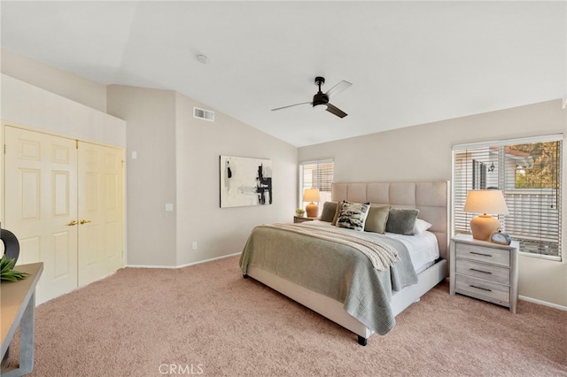 41024 Montelena Cir, Temecula, CA 92591 - bedroom with vaulted ceiling, light carpet, multiple windows, and ceiling fan