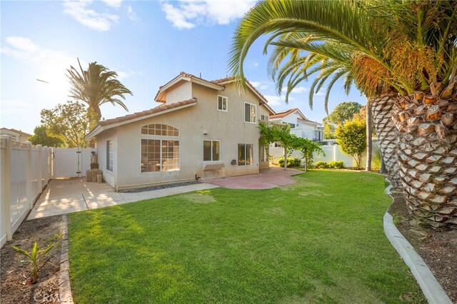 41024 Montelena Cir, Temecula, CA 92591 - back of property with a patio area, a fenced backyard, stucco siding, and a tile roof