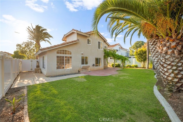 41024 Montelena Cir, Temecula, CA 92591 - back of house with a patio, a fenced backyard, stucco siding, and a tiled roof