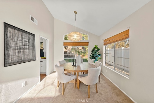 41024 Montelena Cir, Temecula, CA 92591 - carpeted dining room featuring vaulted ceiling and baseboards
