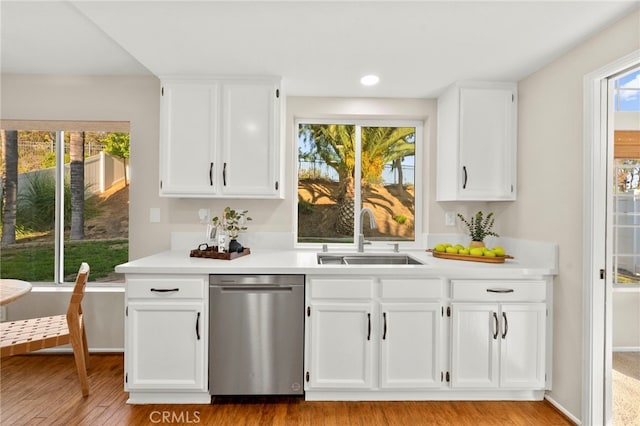 41024 Montelena Cir, Temecula, CA 92591 - kitchen with dishwasher, light countertops, light wood-style flooring, and recessed lighting